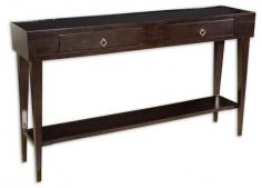 The Antero Console Table is adaptable to many styles. Javanese mango wood stained dark, satin espresso. Impeccably constructed, dovetail drawers are accented with antiqued, solid brass hardware. Exclusively designed by Matthew Williams. Dimensions: 50.00" W x 30.00" H x 12.00" D Weight: 47 lbs.