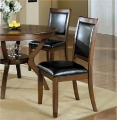 Set of 2 walnut dining chairs Sturdy wood and walnut ash veneer construction Dark walnut finish and black faux leather Padded seat and back18-inch seat height Dimensions: 22.5W x 19.75D x 38H inches. For seating that's smart and sophisticated choose the Monarch Specialties Morland Dark Walnut Dining Side Chairs - Set of 2. This exceptionally crafted pair is great for creating a contemporary look in any casual or formal dining setting. The dark walnut and black upholstered leather padding make this a stunning collection that's not only pleasing to the eye but incredibly comfortable to sit in as well. The solid wood construction is quite sturdy and extends all through the frame and the high supportive back which is also padded. Let the Morland Dark Walnut Side Chairs set provide you with years of long-lasting enjoyment. Measures 22.5W x 19.75D x 38H inches. Some assembly is required.