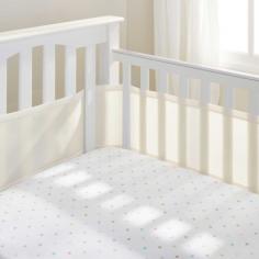An alternative to traditional crib bumpers, the BreathableBaby mesh crib liner in ecru prevents your babys arms or legs from getting stuck in the crib slats. Its made of 200-thread count polyester mesh fabric for optimum ventilation and to prevent suffocation. This breathable crib liner offers a soft surface for your baby. Hypoallergenic and PVC-free. It fits most standard-sized cribs. Available in packs of 2. Color: Ecru. Gender: Unisex.