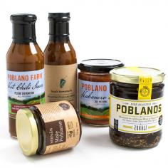 The rustic flavor of the Mexican poblano pepper is found in the sauces, salsa and peppers of the Poblano Collection. Dave's signature BBQ Dipping and Grilling sauce has a depth of flavor that comes from fire roasting all of the key ingredients: tomatoes, poblano chiles, sweet onions and garlic. The tasty fire roasted poblanos are marinated in a succulent special blend of soy sauce, lime juice and a secret mix of spices that will leave you craving for more. The Mole Poblano sauce by Hernan is a blend of 28 chilies and spices balanced by nuts, chocolate, raisins, piloncillo (Mexican unrefined cane sugar), and other natural ingredients. Crafted in Mexico from 100-percent natural ingredients, Hernan's product is made using traditional roasting and grounding methods that result in a thick spicy mole paste. Poblano Farm's Plum Sriracha Hot Chili Sauce is a spicy-sweet blend of thai red chilies, plums, fresh garlic, and rice wine vinegar. Plus there is no added sugar to this sauce, which keeps it from being too sweet. The Poblano Farm is a small sustainable pepper and tomato farm located in South Kingston, Rhode Island. These roasted salsas features the bold flavors of Poblano peppers complemented with the brightness of tomato, onion, and cilantro. Set includes: Roasted Poblano BBQ Sauce (13.9 oz), Fire Roasted Poblanos (16 oz), Mole Poblano Sauce by Hernan (7.19 oz), Plum Sriracha Hot Chili Sauce (10 oz), Poblano Farms Salsa (16 oz) Brand: igourmet Container: Glass Weight: 4 pounds NOTE: Due to seasonality some items may need to be substituted for product of equal or greater value. Due to the perishable nature of food items, returns are not accepted by state law.