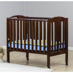 Just fold up this Dream On Me hardwood crib and you'll be ready to hit the road, and then unfold the two-in-one design into a crib or play yard in seconds. Product Features: Hooded, locking wheels let you move the crib with ease. Nontoxic finish keeps your little one safe. Product Details: 38H x 26W x 40D Wood Spot clean Mattress not included Some assembly required Manufacturer's 30-day warranty Model numbers: Cherry: 682-C White: 682-W Espresso: 682-E Natural: 682-N Black: 682-K Promotional offers available online at Kohls.com may vary from those offered in Kohl's stores. Size: One Size. Color: Brown. Gender: Unisex. Age Group: Infant. Material: Hardwood.
