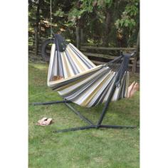 Stand dimensions: 108L x 48W x 44H. Includes hammock, stand, and all hardware. Quickly assembles without any tools. Sturdy steel frame available in your choice of finish. Colorfast 100% cotton hammock available in your choice of color. Accommodates 2 adults. Product weight is 35 lbs. with a 450-lb. weight capacity. Hammock length: 10 ft. 8 in. Bed length: 8 ft. 2 in. Bed width: 5 ft. 2 in. Tube steel frame is 1.75 in diam. Includes polyester carry bag. With the Vivere Double Fabric Hammock with Steel Stand, you can go from setup to snuggling in no time. The stand only needs a small 9 ft. x 4 ft. space for setup (overall hammock length is 10 ft. 8 inches), and can be assembled in minutes, with no tools necessary. This colorfast 100% cotton hammock comes in your choice of color with coordinating stand. Weight capacity is 450 pounds, hammock and stand weigh 35 pounds. This hammock is perfect for sharing with someone you love - or for stretching out by yourself. About Vivere Ltd. Meaning to live, Vivere's hammocks, stands and accessories provide new and fun ways to enjoy outdoor living. Vivere offers high quality, contemporary designs and exciting colors in each of its hammocks, which make the perfect take-along for a day at the beach, camping, or a peaceful afternoon in your own backyard. Just add a favorite book and a glass of lemonade, then ease back for a day of restful relaxation. Take your afternoon siesta on the road with you. This fabric hammock and steel stand are designed to travel well. The stand assembles quickly without any tools and is made of durable steel with a powder-coated charcoal finish. The hammock is made of colorfast 100% cotton and comes in zesty stripes. It is just the right size for two adults yet holds up to 450 pounds so is happy to withstand a kid or two as well. This set comes with everything you need to take it with you even a handy carrying bag. Napping made easy! Color: Desert Moon. Material: Desert Moon.