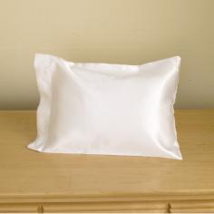 This pillow with satin case will fit perfect with any child's bedroom decor. Features: -Material: 100% Polyester-Easy care, machine wash-Product Type: Pillow Case-Pattern: Solid-Color: White-Primary Material: Polyester -Primary Material Details:.