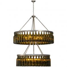 Capture the life of the party with the whimsical and dramatic design of this expansive Wine Bottle Chandelier. So much fun that you may want to hang from it, but don't! Liven up a restaurant, club, hotel lobby or home with a chandelier that does so much more then deliver light; it adds personality and pizazz. Each of the two rings holds 40 authentic Antique Green wine bottles upright and is featured in a Raw Steel finish. More than six and one-half cases of wine bottles total. Handcrafted by Meyda artisans in the USA. Custom options available, including energy efficient lamping. Custom Crafted In Yorkville, New York Please Allow 50 Days Product info furnished by Carolina Rustica.