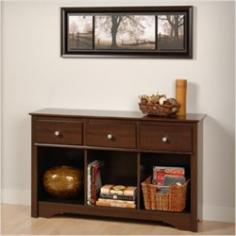 The perfect addition to a living room or den, this unit incorporates three drawers for lots of storage, and its 16-inch depth is suitable for decorative dishes, books and baskets. Features include a profiled top, side moldings and an arched kick plate, as well as brushed nickel knobs and drawers that run on smooth, all-metal roller glides with built-in safety stops. Constructed from high quality laminated composite woods. Assembled Dimensions: 48W x 30.25H x 16D.