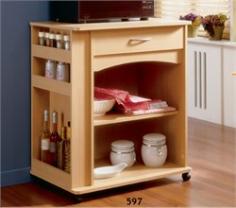 Keep your kitchen or office lunch room clutter-free with the Delissio microwave center! This wooden microwave cart comes with storage benefits for more than just your microwave oven; store everything including cook books, small appliances, spice bottles, and other kitchen accessories on the multiple shelving components. The microwave stand has a narrow side area with three stationary shelves, and a large open main area with one adjustable shelf, plus a front utility drawer for cooking utensils, linens and more! Constructed of laminated engineered wood, this kitchen microwave cart is offered in a fresh Natural Maple finish. It uses a European cam lock quick assembly system and comes with a 5-year limited warranty. Nexera is an environmentally friendly company and whenever possible, uses recycled materials.