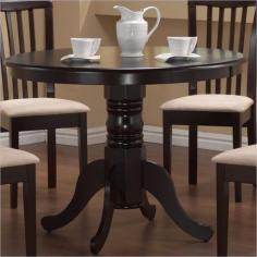 Brannan Round Pedestal Dining Table - Cappucino by Coaster 101081. With relaxed elegance, this round pedestal table will make a charming addition to your breakfast nook or casual dining room. The delicate carved detail and generous curves of this single pedestal offer graceful designs. Arrange with matching upholstered side chair to add a touch of contemporary flair. Available in a cappucino finish. Space saver: Helps to utilize space more effectively. Specification This item includes: CO-101081 Brannan Round Pedestal Table 40 Dia x 30H Please refer to the Specifications to determine what items are included since sometimes the image shows more or less items. If you are not sure, please contact us and our customer service will be glad to help.