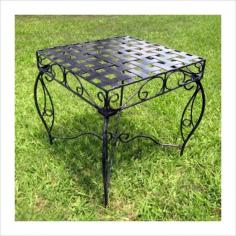 Patio side table woven with contemporary style Constructed from durable pure wrought iron material Sleek black finish with waterproof protection Tasteful design blends with any existing furniture Table dimensions: 20L x 20W x 22H inches Complete your alfresco conversation set with the Mandalay 20 in. Wrought Iron Patio Side Table. Constructed from durable wrought iron material, this handsome side table features a sleek black finish that easily blends with any existing decor. Complete with a UV-protective coating, this table will not fade from exposure to harsh weather conditions. Keep your favorite book, magazine or beverage nearby while you're soaking in the summer sun. About International Caravan, Inc. For nearly half a century, International Caravan, Inc. has been scouring the world for unique furniture and home decor products to bring to the international market. Today, International Caravan, Inc. is ranked as one of the leading import and wholesale distributors in the nation. Their products can be found on the largest E-commerce websites as well as in America's leading retail stores.