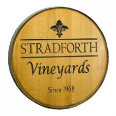 This barrel head design is perfect for both the wall and with a stand as a bistro table. Just add your family/vineyard name & established date for the perfect addition to any room. Sure to add some classic style to your home and impress your guests. Simply add to cart and enter personalization of 2 lines, line 1 up to 12 Characters, line 2 - 4 Character year. This product is hand crafted and made-to-order, providing you with a well-made, uniquely designed item. No two will ever be the same. As such, production time may exceed 30 days. Please note that due to the made-to-order quality of this product, orders cannot be cancelled after the first 48 hours. We assure you that it will be well worth the wait. Materials: Wood Wine Barrel Dimensions: 22"L x 2"W x 22"H Weight: 18 lbs"