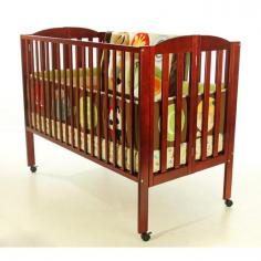 With a one-step folding system, this Dream On Me crib offers a simple storage solution with no disassembly. Product Features: Nontoxic finish protects baby from harmful chemicals. Stationary side rail keeps little one secure. Locking wheels provide easy mobility. Product Details: 46H x 31W x 54D Mattress & bedding (not included) Wood Some assembly required Manufacturer's 30-day limited warranty Model numbers: Cherry: 673-C Espresso: 673-E Black: 673-K Natural: 673-N White: 673-W Promotional offers available online at Kohls.com may vary from those offered in Kohl's stores. Size: One Size. Color: Brown. Gender: Unisex. Age Group: Infant. Material: Wood.