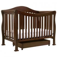 This grand standing crib features an elegant swooping front side that is built for parents to take their little ones out of the crib with little effort. Plus, it grows with baby with the included toddler bed conversion rail kit. Later, it can convert again to a full size bed with the purchase of the full size bed rail kit (sold separately). Features: Adjustable 4 level mattress spring system to adjust to your infant's growth Convertible design: can be used as a crib, toddler bed, daybed and full size bed Includes toddler rail kit and full size headboard and footboard Converts to a full size bed with full size bed rail kit K4799X (sold separately), please note Parker Crib in White (K5101W) matches withM4799W full size rail kit. Two compartment trundle under crib provides extra storage Solid New Zealand pine wood construction Dimensions: 59"L x 31"W x 47.5"H Note: These custom finishes are exclusive to the Parker Collection and will not coordinate with other collections. Gift Wrap not available.