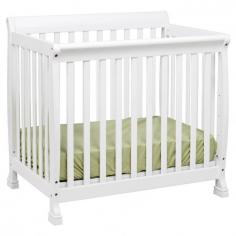 This DaVanci convertible mini crib is a sleek choice with a two-in-one design that allows the crib to transform into a twin-sized bed. Product Features: New Zealand pine construction offers lasting durability. Nontoxic finish keeps your little one safe. Product Details: 38H x 40W x 27 7/8D Wood Spot clean Converts to twin-sized bed with M4799 rails (sold separately) Mattress not included Some assembly required Imported Manufacturer's 1-year warranty Model numbers: Cherry: M5598C White: M5598W Espresso: M5598Q Ebony: M5598E Oak: M5598O Promotional offers available online at Kohls.com may vary from those offered in Kohl's stores. Size: One Size. Color: White. Gender: Unisex. Age Group: Infant. Material: Wood/Pine.