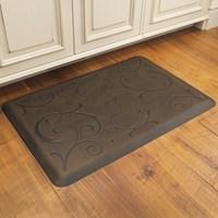 Bella by WellnessMats is a premier anti-fatigue mat. This revolutionary floor mat is ergonomically engineered and medically proven to provide unsurpassed comfort, safety, relief and well-being while you stand. WellnessMats are perfect in the kitchen, vanity, laundry and even in the garage. Proudly made in the USA, WellnessMats continue to be proven effective and virtually indestructible in the toughest commercial environments. WellnessMats are the mat of choice for world-renowned chefs and are found in professional and residential kitchens, hotels, airports, spas and retailers all over the world. WellnessMats' unique one-piece construction from a proprietary formulation of 0.75-inch thick, 100-percent polyurethane is the gold standard for anti-fatigue mats. Pattern/color: Bella antique dark Exceptional comfort Resistant to punctures, tears, abrasions, stains, slips and wear Safe and non-toxic, PVC and BPA-free (so no noxious smells or off-gassing) Will always lie flat, never delaminate or curl up at the edges, never compress or wear through Easy care: Simply wipe clean with a damp cloth or sponge, use any common household cleaner or sweep clean of dirt and dust Materials: 100-percent polyurethane Dimensions: 36 inches long x 24 inches wide x 0.75 inch thick Model: B32WMRDB The digital images we display have the most accurate color possible. However, due to differences in computer monitors, we cannot be responsible for variations in color between the actual product and your screen.