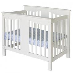 Perfect for small spaces, this mini crib has that Annabelle charm in a space-saving size. With wooden bed rails (sold separately), it converts into a twin bed for when baby's all grown up. Features: Sleek, stylish design Mattress support has 4 different levels to adjust to the growth of your baby 1" mattress pad included. Can be converted to twin size bed with conversion rails sold separately (M4799) Lead and phthalate safe Non-toxic finish Made of solid New Zealand Pine wood from sustainable forests and engineered wood products JPMA Certified Assembly required Dimensions: 38" W x 25.25" D x 43.5" H Gift Wrap not available.