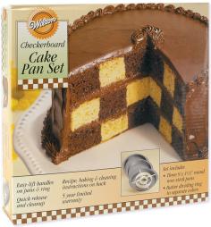 WILTON-Checkerboard Cake Pan Set. With this unique baking set you will create cakes with an exciting multicolored pattern: there is style in every slice! Baking is easy with the Batter Dividing Ring included. Just place the Dividing Ring in one of the three 9x2in pans in the set and follow instructions for adding dark and light colors of batter in the divisions. Use the Dividing Ring's easy-lift handles to lift out ring before baking; then stack cakes to form the checkerboard. Enjoy two tastes in one cake: try the Golden Yellow/Chocolate recipe on the package. Great for colorful holiday cakes too! This package contains three 9x1-1/2in round non-stick cake pans with over-sized handles and one plastic batter dividing ring. Imported.