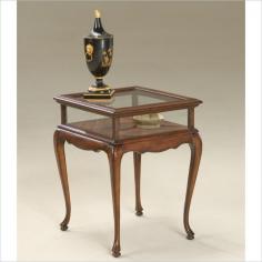 Sure to be cherished by anyone who owns it, this elegantly crafted curio table features a rich cherry finish with delicate cabriole legs to provide classic styling. The hinged glass top reveals a storage area for your favorite photos, awards or collectibles. Hinged glass top and sides Delicate cabriole legs Set includes: One (1) curio table Materials: Poplar wood solids, wood products, cherry veneer, hardware, glass Finish: Plantation cherry Hardware finish: Antique brass Dimensions: 24.5 inches high x 18 inches wide x 20 inches deep Assembly required. This product is part of our 'Main Street Revolution' - a partnership between Overstock.com and small businesses around the USA. What is the Main Street Revolution? Butler Specialty Company is a family-owned business, celebrating their 86th year in 2015, with a long-standing commitment to excellence and integrity. Detail and artistic skill go into every piece with the same workmanship that established Butler as an early success. Wood chests and tables are made with dovetail joints and dowel joints just as they were when Harry Bergman founded the business. Third-generation owner David Bergman scours the globe for the best designs, production sources and finest materials for Butler's world class designs. Today, Butler leads the accent furniture industry with more than 2,000 products, featuring accents for every room in the home.