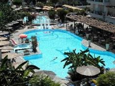 This fully refurbished family resort is very nicely situated just beside the beach, and within walking distance of the marina. It is only a 10-15 minute-walk to the center of Kos, although many restaurants can be found within short distance. The main touristic and historic sites, such as Askleipion, Casa Romana and the Ancient market, are within easy reach of the hotel, approximately 1.5km away. This is the ideal place for families with children that wish to enjoy lively holidays under the sun.