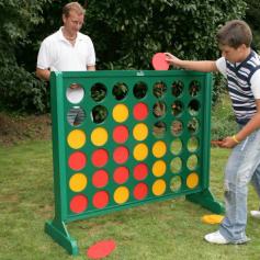 Big 4 Giant Garden Game Big 4 is a fantastic children's garden toy that can be enjoyed by the whole family! In the same style as Connect 4, the aim of the game is to get 4 of your coloured counters in a row. Whether you want to bond with the kids or fancy a BBQ party with your mates, the Big 4 Giant Garden Game will at a hilarious twist to your day. This impressive outdoor toy can be enjoyed by people of all ages and will keep you entertained all day long! Everything seemed massive when you were a kid, chomping on Monster Munch as if they were apples, getting your greasy mitts all over your precious game of Pop Up Pirate or Kerplunk that was as tall as you were with pole vaults as sticks. This giant garden game will bring you back to those heady days of Honey I Shrunk the Kids in a flash! Easy to play and so much fun to use, Big 4 is big fun! Big 4 Giant Garden Game Big 4 is an outdoor garden toy like Connect 4 Try and get 4 of your giant counters in a row either horizontally, vertically or diagonally! Beautiful treated wood frame with plastic counters Big 4 measures approx 120cm x 120cm x 13cm A fantastic garden game for ages 4 to 140! Next Day delivery available for mainland England, Wales, Isle of Wight and N. Ireland only (Not including Scottish Highlands, Isle of Man, Southern Ireland, Scilly Isles) Unfortunately Before 9am delivery is unavailable for this item Due to the weight of this product, it cannot be shipped overseas Garden not big enough for ball games? Mum keep screaming at you for treading on her Petunias in your attempt to get to Mount Compost, on your ever struggling quest to find new civilisation in the raised flower bed? Our Big 4 Giant Garden Game is a huge load of fun in a contained space! What's in the Big 4 Giant Garden Game Box? 1 x Big 4 Giant Garden Game 42 x Counters 1 x Set of Instructions Why You Should Buy From Us! 30 day money-back guarantee Low-price guarantee Loyalty points discount off future orders Huge range of unique gift ideas for all occasions Excellent customer service Next day delivery available (Cut Off 11 am) Big 4 Giant Garden Game
