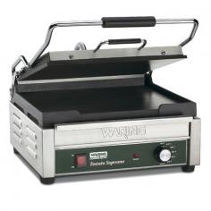 Warings Panini Sandwich Grill the Tostato Supremo WFG250 is a large electric grill toaster with flat cast iron plates that produce sandwiches of warm, melty goodness with beautifully browned bread. The WFG250 Sandwich Grill has a 14-1/2 x 11 cooking surface. The top plate is hinged and is lifted up and down with a heat-resistant handle. The Panini Grill accommodates foods up to three inches thick thanks to the auto-balancing upper plate, so you can grill up sandwiches stuffed with fillings. This Sandwich Grill is designed to handle heavy commercial use and features a durable brushed stainless steel body and removable drip tray for easy clean up.