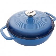 3 quart Dutch oven with lid. Porcelain enamel cast iron in graduated blue finish. 9.75 inch diameter. Convenient handles on base. Knob on lid - oven safe to 500 degrees. Hand wash with soapy water and plastic or nylon scouring pad. Dishwasher safe. Use only wooden or silicone utensils. Suitable for use on all cooking surfaces - even induction. Limited lifetime warranty. Perfect for the refined cook who loves style as much as function, the Lodge Color Enamel 3 Qt. Dutch Oven in Caribbean is the perfect size for cooking family meals or side dishes and has a graduated blue enamel finish that will look beautiful on your dining table. This classic round enamel cast iron oven has handy touches like the large, easy to grab knob on the lid - it's oven safe to 500 degrees - and the two handles on the base that make this a cook's best friend. By combining the superior cooking performance of enamel cast iron construction with the unparalleled beauty of the nuanced blue finish, this durable oven is on its way to becoming a family heirloom. Cast iron has excellent heat retention and diffusion properties, meaning cast iron vessels maintain heat and cook food thoroughly and evenly, no matter the cooking surface. It even works with induction heating elements. An enamel coating eliminates the need to season the metal and allows for more thorough cleaning, and makes the gorgeous graduated blue finish possible. Dishwasher safe. About Lodge Manufacturing Founded by Joseph Lodge in 1896, Lodge Manufacturing is the oldest family-owned cookware foundry in America and is a market leader in cast iron cookware. Nestled alongside the Cumberland Plateau of the Appalachian Mountains is the town of South Pittsburg, Tennessee, where Lodge produces the finest cast iron cookware in the world. The company offers the most extensive selection of quality cast iron goods on the market, including skillets, Dutch ovens, camping cookware and more. Lodge is also an eco-responsible company, with programs to reduce hazardous waste, reuse foundry sand, establish new ponds for plant and animal life, and plant new trees on the Lodge campus.