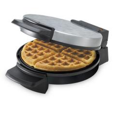 A Delicious Dish Fit for Royalty Nonstick cooking grids wipe quickly clean 2 Nonstick waffle grids with extra deep grids 3 Ready indicator light 4 Vertical Storage Base 5 Convenient cord wrap Ah, the Belgian waffle. A delicious dish fit for royalty; only now, with this easy-to-use Black Decker marvel, the breakfast and dessert staple comes home to treat the king - or queen - of your castle anytime. Two nonstick waffle plates contain extra-deep grids for restaurant-style creations that will capture whatever gourmet topping you choose to serve, from fresh fruit and golden butter to ice cream dusted with powdered sugar. When done, a vertical storage base and tidy cord wrap turn this waffle-making wonder into a space-saver s dream, too. Batter up!