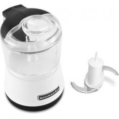 White 3.5-cup food processor. Comfort design for easy operation. Includes BPA-free chopper bowl, stainless steel blade. Bowl and lid are dishwasher-safe. Dimensions: 5.75 diam. x 9.1H inches. If you're like us, you think of extra ingredients as you go when you're in the kitchen concocting your latest masterpiece, and that's why we like the KitchenAid KFC3511 3.5-Cup Food Chopper in White. Its domed lid lets you add wet and dry ingredients without removing the lid! Very handy. It also offers exceptional performance with a simple, one-touch operation, and a reverse spiral action stainless steel blade that pulls food down, resulting in evenly chopped sizes. About KitchenAidFor over 80 years, KitchenAid has been devoted to creating innovative cookware that inspires culinary excellence. From the original Stand Mixer first created in Troy, Ohio, this industry leader now offers a wide assortment of cookware, bakeware, kitchen accessories, and appliances. All products are designed with your cooking needs in mind and are engineered to exceed the highest manufacturing standards. Since 1919, KitchenAid has been synonymous with quality and value. As a result, all KitchenAid products are backed by exceptional, industry-leading warranties. Check out the complete line today.