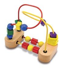 Sitting in a high chair is much more fun with this fantastic bead maze. Featuring brightly colored, multi-shaped beads that spin and slide along red and yellow wire pathways that are anchored by a strong suction cup base. Encourages color recognition, hand-eye coordination and fine motor development through play!