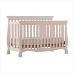 Dimensions: 59W x 29.9D x 40.8H in. 4-in-1 crib converts to toddler bed, daybed, and full size bed. Sturdily made of solid wood and wood products. Meets and/or exceeds North American and Canadian safety standards; JPMA certified. Choice of rich, durable non-toxic finishes. Shop other coordinating pieces in the Venetian Collection. Easy to assemble with permanently attached instructions. Timeless aesthetics and graceful curves give the Storkcraft Venetian Convertible Crib a refined elegance that makes its presence felt in any setting. And it's versatile to boot! The crib will grow with your child as it converts from a full size crib to a toddler bed, to a daybed, and finally to a full-size bed by adding bed rails (sold separately). All four sides of this crib are stationary for maximum security, while the adjustable three-position mattress support base makes sure your little one sleeps comfortably through every stage of infancy. Constructed of solid wood and wood products, this handsome crib in available in a selection of non-toxic, durable finishes to complement most nursery interiors. The Venetian crib is JPMA certified and meets and/or exceeds North American and Canadian safety standards. Additional Features: Adjustable 3-position mattress support base All 4 sides are stationary to add to the security and stability Fits standard size crib mattress (sold separately)Toddler rail is included Full-size bed rails not included About StorkcraftThe mission of Storkcraft is to provide families with the safest, most reliable products for children. Their commitment to innovation and state-of-the-art technology has positioned them as the industry benchmark for superior product quality. For 60 years Storkcraft has exceeded the expectations of customers. Unprecedented growth and success has made Storkcraft one of the largest kids' products suppliers in the world. Storkcraft has emerged not only as a world leader but also as a company that generously supports communities, while practicing social and environmental responsibility. The secret to the company's century of success has been the unwavering loyalty, dedication, and professionalism. They create quality products at affordable prices. Color: White.