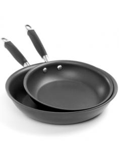 This outstanding twin pack gives you two exceptional pieces of cookware that will enhance and add to any well equipped kitchen. One of the most used pans in any well-equipped kitchen. French skillets have sloped sides so that foods slide out easily. Includes: 10-in. and 12-in. French Skillets Restaurant tested by professional chefs, DuPont's Autograph 2 surpasses all other standard nonstick formulas by delivering enduring nonstick performance inside and outside the pan with superior durability that stands up to the rigors of professional kitchen. Heavy gauge hard-anodized aluminum offers exceptional gourmet cooking performance. SureGrip Handles, a combination of durable stainless steel and silicone rubber, are durable and ergonomic, providing a soft, confident grip. Oven safe to 400&deg;F. Lifetime Limited Warranty.