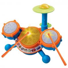 Kids Learn and Play with this Electric Toy Drum Set Encourage your children to be musical with this Vtech Kidibeats drum set. It is a small toy drum set that includes three drum pads, a cymbal and two drumsticks. Children can play freestyle or with nine pre-set tunes, and they can also learn letters and numbers through this educational toy. Each drum on this electric toy drum set lights up with LED lights to help a child follow along and learn. Children can choose different types of music to play, including pop and rock. Each drum pad and cymbal makes a different sound, similar to a real drum set, so the child will engage with the set and learn music. This toy is intended for children aged two to five. Help your child learn music, numbers and letters with this fun toy he'll enjoy!