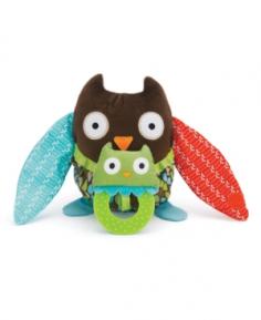 The Skip Hop Hug and Hide Stroller Toy Owl is a peek-a-boo baby toy that can come along for the ride! Your little one will stay entertained on stroller rides with stimulating sensory details like soft textures, tuggable teethers and a "baby" owl secured behind the mama stuffed animal's wings. The Owl's velcro loop attaches easily to any stroller. Ages 0 and up. Safety-tested to meet or exceed ASTM, CPSIA, EN71 and applicable safety standards. Skip Hop is a New York City-based designer that creates fun, practical baby products and donates a portion of all its profits to charities benefitting parents and children. Gender: Unisex.