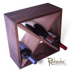 RCHR1026: Features: -Material: Solid walnut. -Oak inserts. -Holds 12 standard bottles. -Non-skid feet. -Teak oil. -Dove tailed craftsmanship. Country of Manufacture: -United States. Product Type: -Wine bottle rack. Finish: -Walnut and oak. Material: -Wood. Mount Type: -Tabletop. Wine Bottle Capacity: -12. Dimensions: Overall Height - Top to Bottom: -15.5. Overall Width - Side to Side: -15.5. Overall Depth - Front to Back: -7. Overall Product Weight: -12 lbs.
