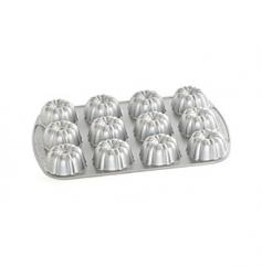 This Mini Bundt Pan from Nordic Ware is the ideal pan to use for creating twelve 1/4-cup miniature-size muffins, bundt- or pound cakes when guests are expected. Serve the individual cakes or muffins for brunch, for afternoon tea or for dessert in the evening. The pan's cast aluminum ensures superior cooking performance and even baking, and the professional hard coat, nonstick surface means the effortless removal of baked goods and easy cleanup. Two side grips allow for easier handling.