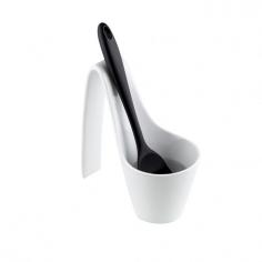 Shop for Spoon Rests from Hayneedle.com! The Curtis Stone Keep it Clean Ceramic Spoon Rest is so cool that your forks might get a little jealous. This stylish yet practical spoon rest features a chamber that holds water, so you get a clean spoon each time you place it inside. Set it on your stovetop or kitchen counter to protect surfaces from food drippings and other cooking fluids. Dishwasher-safe, this elegant spoon rest is made of smooth, durable vitrified porcelain in a classic shade of white. About Curtis StoneA culinary rock star with an Aussie accent, spiky blond hair, and big smile, Curtis Stone started cooking as a boy, learning from his mom and grandmother in Melbourne, Australia. The Los Angeles-based chef, author, and TV personality has worked in the kitchens of some of the world's top restaurants. He's also hosted cooking programs in the United Kingom, Australia, and the United States. American audiences may recognize him as host of Bravo TV's "Top Chef Masters" and "Around the World in 80 Plates." Through his Kitchen Solutions product line, he gives home cooks the tools to bring "confidence in the kitchen and happiness to the table.