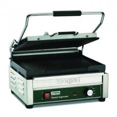 Warings Panini Sandwich Grill the Italian Supremo WPG250B is a large electric grill toaster with ribbed cast iron plates that produce sandwiches of warm, melty goodness with beautifully browned bread. The WPG250B Sandwich Grill has a 14-1/2 x 11 cooking surface. The top plate is hinged and is lifted up and down with a heat-resistant handle. The Panini Grill accommodates foods up to three inches thick thanks to the auto-balancing upper plate, so you can grill up sandwiches stuffed with fillings. This Sandwich Grill is designed to handle heavy commercial use and features a durable brushed stainless steel body and removable drip tray for easy clean up.