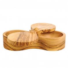 Beauty and function, the double-compartment design allows you to store two different varieties of cooking salt within quick reach. Can also be used with salt and pepper. Handcrafted of richly grained olive wood with an oil finish, it has a swiveling lid for easy one-handed access. Holds 1.7 oz. of salt or pepper in each well (3.5 oz. total). Carved from olive wood, each box has a unique grain pattern. Swiveling lid keeps salt fresh and dry while allowing easy one-handed access. Handcrafted by Brard, maker of fine wood products since 1892.