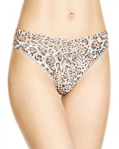Flirty and feisty. Soft signature lace thong flaunts a lush leopard print. Original rise sits high on the hip. Wide stretch waistband boasts a sexy V-shape. Scalloped edges enhance the waistband. Solid trim styles the front and back panel. Lays flat on the body for a smooth look under clothes. Absolutely no VPL! Cotton gusset. As a result of the stretch waist, one size comfortably fits 4-14.100% nylon; Trim: 90% nylon, 10% spandex; Lining: 100% cotton. Hand wash cold, dry flat. Made in the U.S.A.If you're not fully satisfied with your purchase, you are welcome to return any unworn and unwashed items with tags intact and original packaging included.