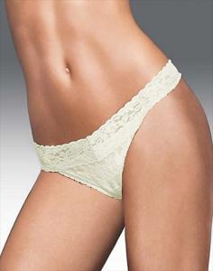 One size classic thong is one size for all! Chic lace is soft and luxurious with sexy V silhouette. Panty stretches for fit flexibility. Wide waistband for ultimate comfort. Flirty everyday wear. Fabric: 84% Nylon, 16% Elastane. Gusset Lining: 100% Cotton. Click on Alternate View to see additional colors. Style 40118.