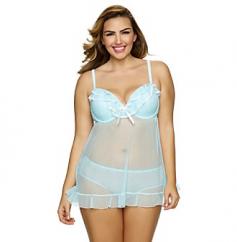 Jezebel Tiffany Plus Size Babydoll with Bikini Panty (999895). A classic lingerie sleep set with grace and sex appeal. Made of a knit blend of nylon and elastane for soft, lightweight comfort. Underwire contour cups are lightly padded for coverage and shape. Neckline is trimmed with a picot edge and dual tiers of ruffled mesh and lace. Sides and back have sewn-on elastic trim for fit. Straps have plush-backing and trim exterior at front with exposed elastic at back. Straps adjust at back with coated metal hardware. Back secures with a coated metal hook-and-eye closure and a functional ribbon tie just below it. Please see Fitter's Comments for hook count. Babydoll is finished with a lettuce-edge hemline with a piped edge. Panty has high-cut legs for a sexy silhouette. Waist and leg openings are trimmed with sewn-on elastic bands for fit. Seamless rear with two tiers of ruffled trim across back. Sewn-in liner for comfort and coverage. Light as a cloud feel. Set includes babydoll and matching panty.