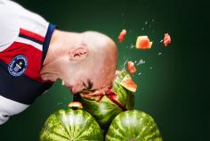 Crushing a watermelon with the head