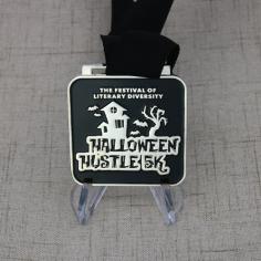 Halloween Hustle 5K Race Medals
The annual Halloween is coming soon, are you ready? Our 5K race medals are made for the Halloween themed race runs. The Halloween medals feature with horrible Halloween style, die struck with flying bats, old house and scared tree in silver color on the black border. In recognition of all the finishers in the 5K event with these race medals. Great Halloween medals for your event and players.

These Halloween Hustle 5K custom medals are 5K race medals, crafted by soft enamel and polished with silver finish. All custom medals are available in gold, silver and copper finish.Each comes with custom medals ribbons and is individually poly bagged. Custom medals no minimum order are required at GS-JJ.
Email: info@gs-jj.com	
Phone: 18888644755
Product link: https://www.gs-jj.com/medals/exhibit/halloween-hustle-5k-race-medals