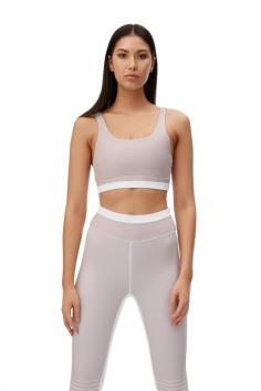 Double lined, removable cupping and an under-bust elastic ensures you feel secure during any workout with water-resistant technology. 

-Fabric technology offers compression like qualities to enhance performance.
- Moisture-wicking
- 4-way stretch
- Quick drying
- Breathable
- water-resistant fabric

Our model is wearing a size small . She usually takes a standard AU 8/Small.

Fabric composition: 73% Polyester & 27% Spandex

Wash instructions: cold gentle machine wash in a protective wash bag and dry flat for best results. 