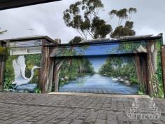 This garage now painted with a spectacular masterpiece complements its surrounding environment with an Elwood canal mural. The piece sums up a mixture of local elements converting the space into a trompe l’oriel and street art scenery infusion. The mural is completely customised to absorb into its available space with a mix of street art character and photorealism to create depth. Painted with 100% aerosol, this piece display’s the possibilities of our professional finish while utilising the surrounding flora and fauna. 