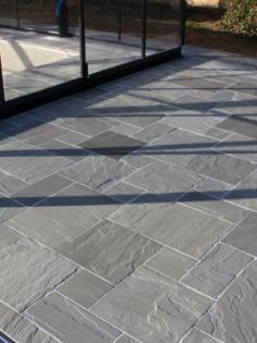 Kandla Grey is light Grey Indian Sandstone widely popular in UK for outdoor patio and gardern paving areas. Get the Best Priced and Top Class Grey Indian Sandstone.
