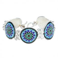 Sterling Silver Meenakari Bracelet

Minakari art is the reminiscence of the colorful and traditional art style of Rajasthan and Gujarat, done here in an alluring blend of shades of green and blue forming a flower pattern. This fashion bracelet decorated with superfine meenakari wheels is an amazing jewel to complement your attire and personality.
Meenakari Bracelet: https://www.exoticindiaart.com/product/jewelry/meenakari-bracelet-LCL38/

Bracelet: https://www.exoticindiaart.com/jewelry/sterlingsilver/bracelet/

Sterling Silver: https://www.exoticindiaart.com/jewelry/sterlingsilver/

Jewelry: https://www.exoticindiaart.com/jewelry/

#jewelry #bracelet #meenakaribracelet #sterlingsilver #indianjewelry