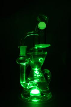 Behold the first of its kind. A LED recycler rig that adds a chill vibe and ambiance to your sessions. Just rotate the power knob to activate the LED light and enjoy watching the water percolate green through the recycler.
https://www.kromedome.co/product/led-recycler-rig/