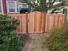 Seattle Fence Contractors is a residential wood & cedar fence provider serving the greater Seattle area. We are licensed, bonded, and insured, and we build high-quality wood fences using cedar lumber and other cedar items. The most cost-effective cedar fence style is the estate style fence. Estate fence is made up of pressure treated 4 1/8" x 4 1/8" posts with a 24 tight knot cedar rail installed on the edge 12" up from the bottom of the posts and a 24 tight knot cedar rail installed on the edge 12" down from the top of the posts. The rails are then secured with 14 fence boards. The tops of the fence boards are trimmed to give the fence a smooth, clean appearance. Our posts are all 24" deep in concrete.
