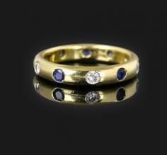 Diamond Sapphire Full Eternity Band Ring in 14K Gold

A simplistic vintage Art Deco-styled full eternity band ring featuring 5 bright-white diamonds alternating with 5 natural blue sapphire gemstones. Shop now at https://boylerpf.com/