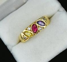 Multi gemstone band ring hand crafted in 18K yellow gold! Featuring marquise shaped amethyst, ruby and citrine open back gemstones, the ring is perfect to wear as a stacking ring, for the July, November or February birthday or as a special anniversary gift or wedding ring. 
Shop now: https://bit.ly/3R2hDwQ