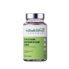 Health Veda Organics Calcium Magnesium Zinc Tablets with Vitamin D3 & B12, a mindful combination of the mineral trio with vitamin duo, helps strengthen bones, enhance mood, boost immunity, regulate blood sugar, and improve sleep quality. Enjoy superior health by increasing energy and vitality with a pack of 60 veg tablets.